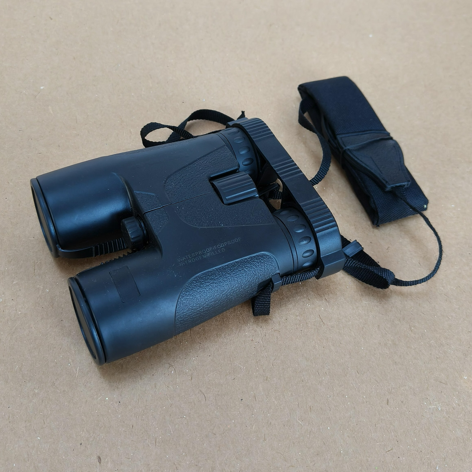 This is a pair of 10x42 nitrogen filled waterproof and fogproof binoculars with 10x magnification and 42mm objective lens.